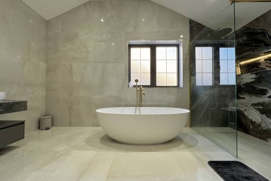 3516L 16 tv shoot location house in Lancashire contemporary bathroom with bath.jpg