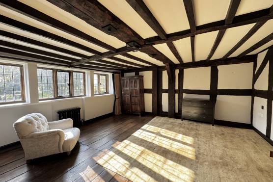 3316C 33 filming location house in Cheshire bedroom with exposed beams.jpg