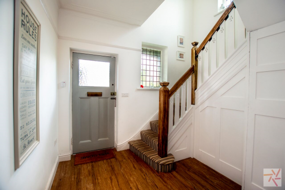 3150C 6 photo shoot location in Cheshire hallway with wooden floor