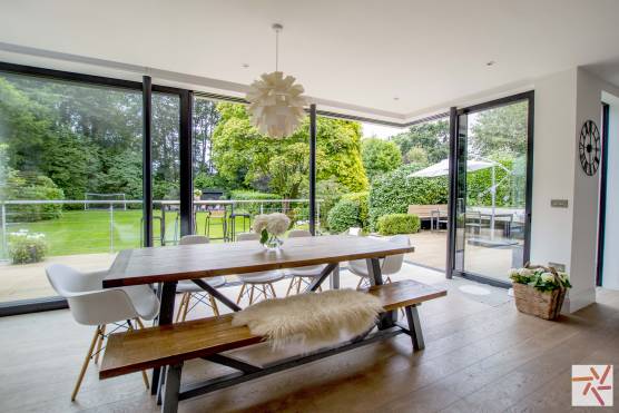 3162C 7 tv drama location house in Cheshire stylish dining area with bi folding doors.jpg