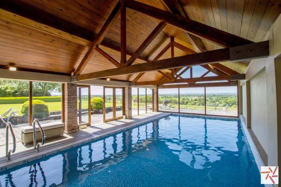 3347C-1-photo-shoot-location-house-in-Cheshire-indoor-swimming-pool-with-rural-view.jpg