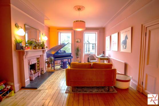 3377C 1 photo shoot location house in Cheshire pink living room with a statement blue piano